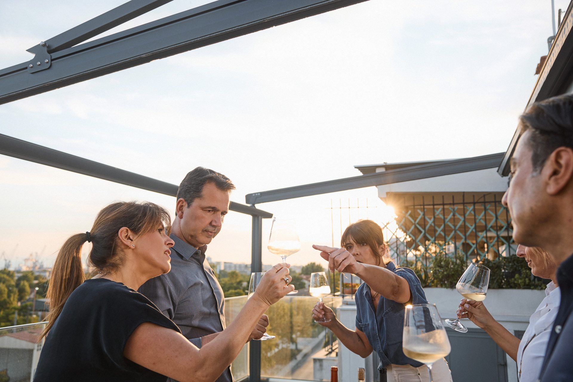 guests raising glasses during a Lokalia_ pop-up event