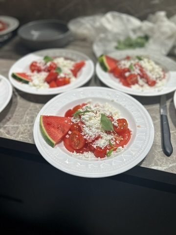 a summer course of watermelon, tomato and fresh cheese